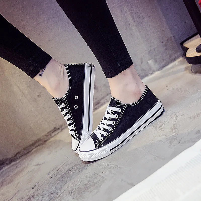 Women's canvas shoes in solid colours with canvas upper, sizes 35-44, on a neutral background.