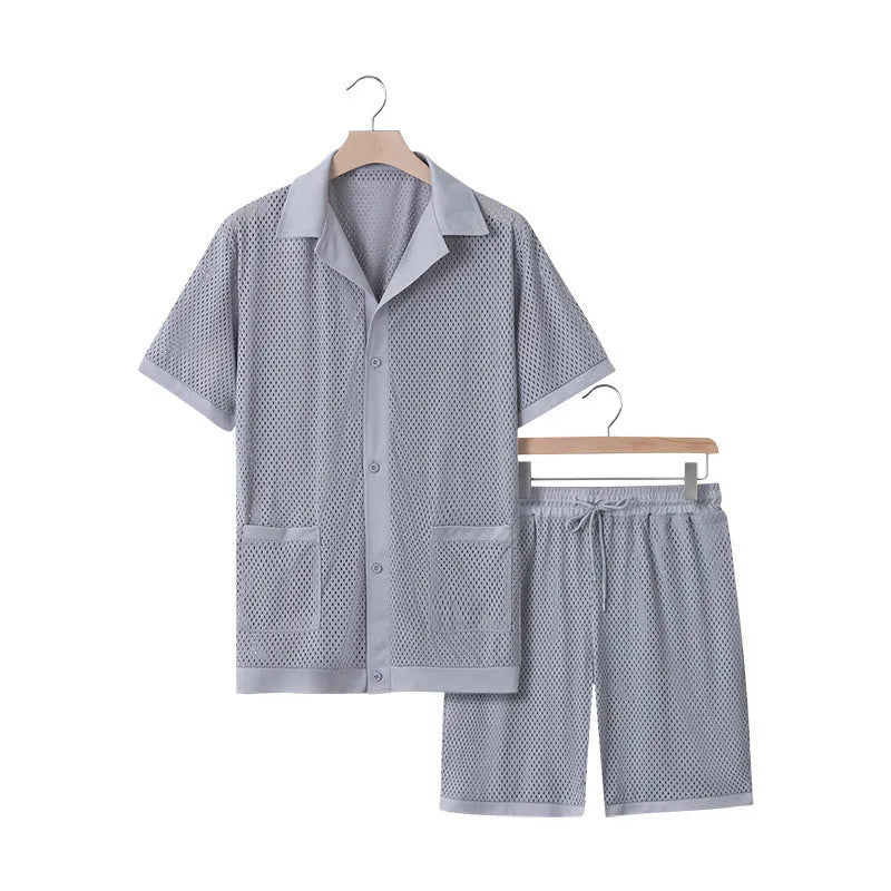 Hawaii see-through summer leisure suit comprising a short sleeve cardigan and matching shorts on a hanger.