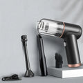 Wireless hand-held wet and dry vacuum cleaner in black or gold with brush, two nozzles, and USB charging wire