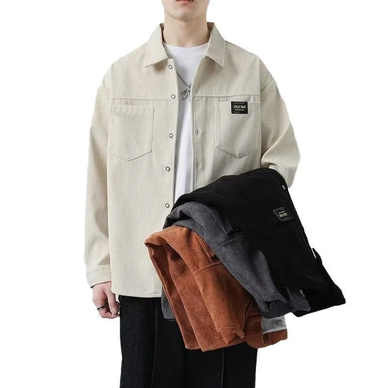 Men's black corduroy cardigan jacket with long sleeves laid flat