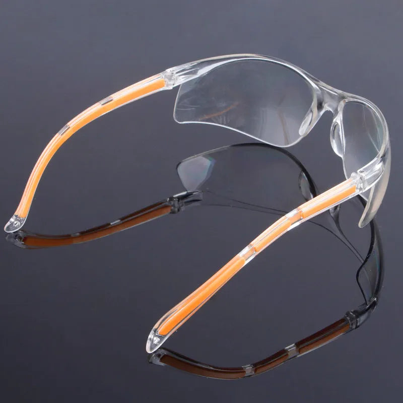 Transparent yellow safety goggles made of polycarbonate for eye protection.