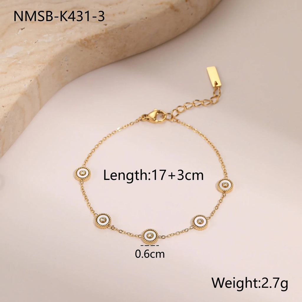 Stainless steel bracelet and necklace set with 18K gold plating and geometric fritillary pattern design