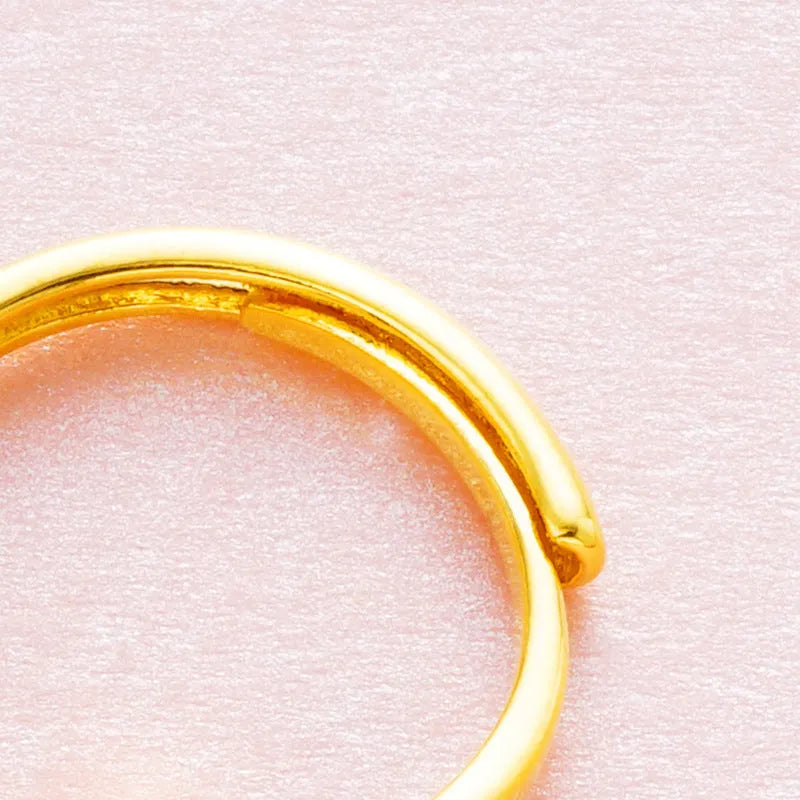 Women's adjustable Vietnam placer gold zircon ring in six colour variations on finger