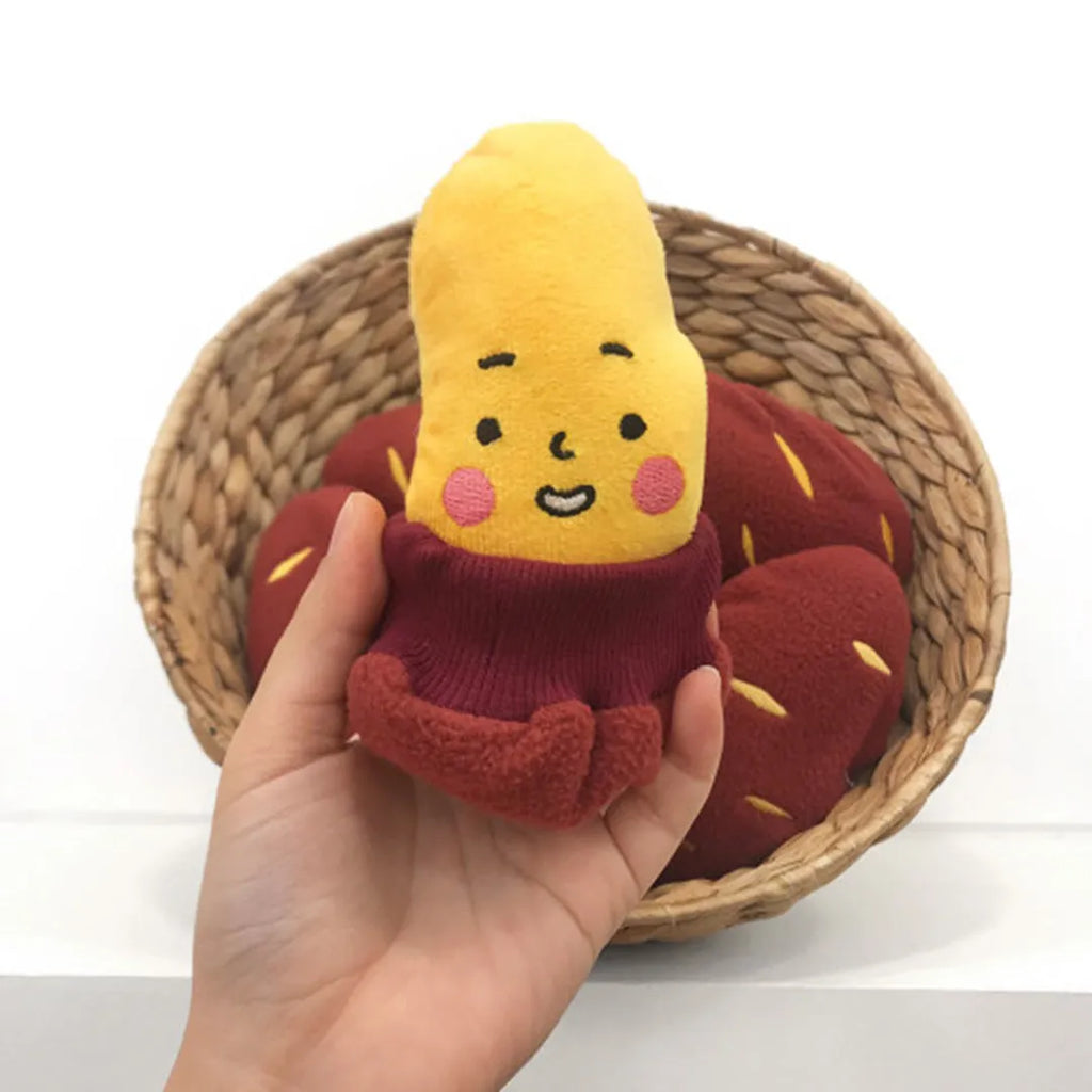 Sweet potato pet puzzle toy with removable peel showing internal food pockets for hiding treats