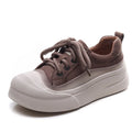 Women's yellow full grain cow leather lace-up casual shoes with round toe and rubber sole.