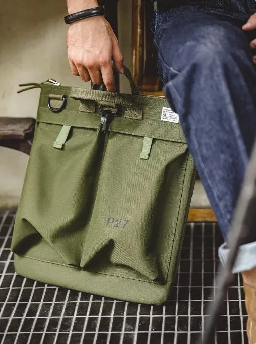 Marden Tooling Helmet Canvas Crossbody Bag in charcoal black showing vertical square shape and shoulder strap