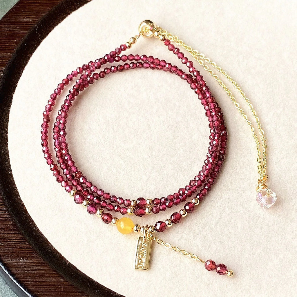 Wine red garnet bracelet with beeswax cut beads that can also be worn as a necklace.