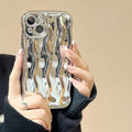 Electroplating wave stripe iPhone case showing textured back pattern and colour options including silver, purple, and black finishes