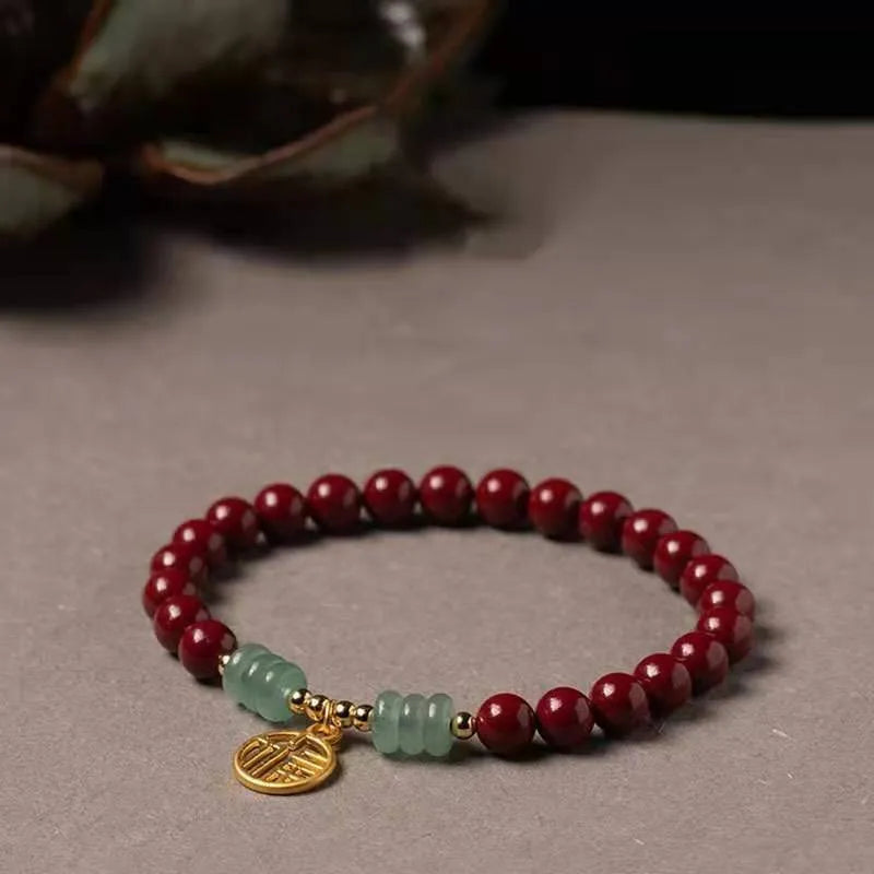 Gold cinnabar wave bracelet with solid copper beads in handcrafted national style design