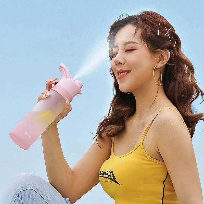 Large plastic spray water bottle with handle strap and leakproof lid in multiple colour options