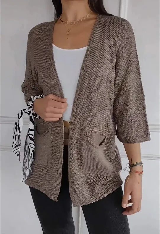 Women's waffle texture cardigan coat in army green with pocket detailing and regular sleeves