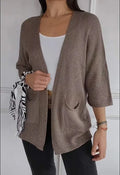 Women's waffle texture cardigan coat in army green with pocket detailing and regular sleeves