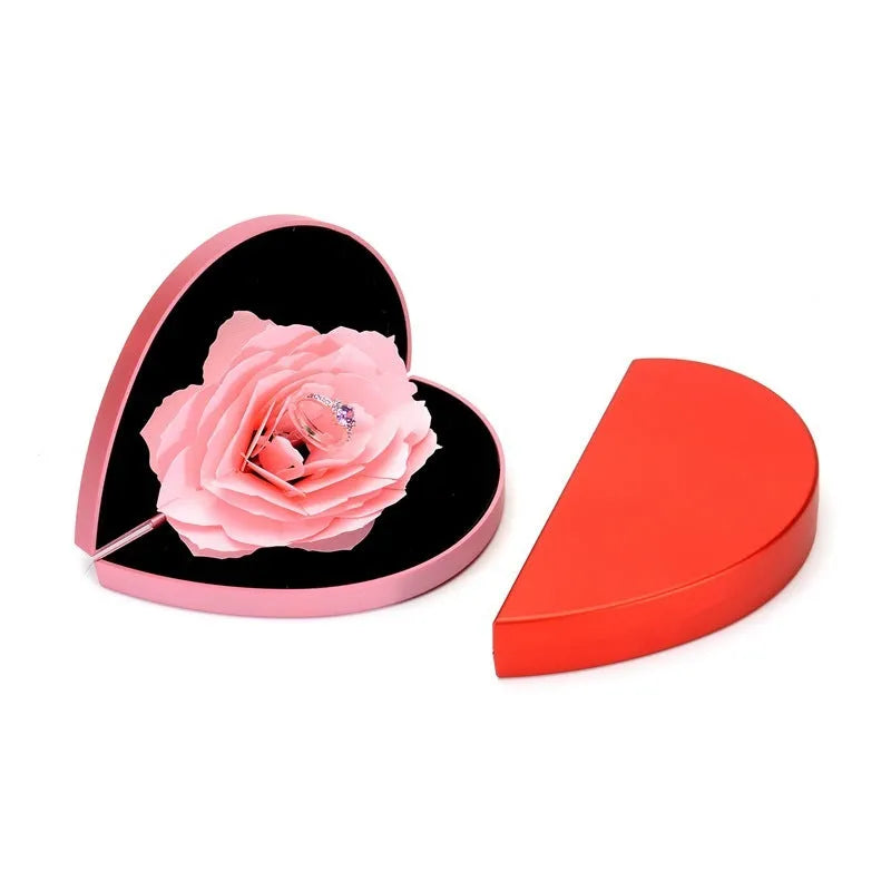 Rotating heart-shaped ring box with 3D rose decoration in red colour