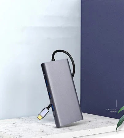 10-in-1 USB C docking station power bank compatible with Apple MacBook and iPhone devices