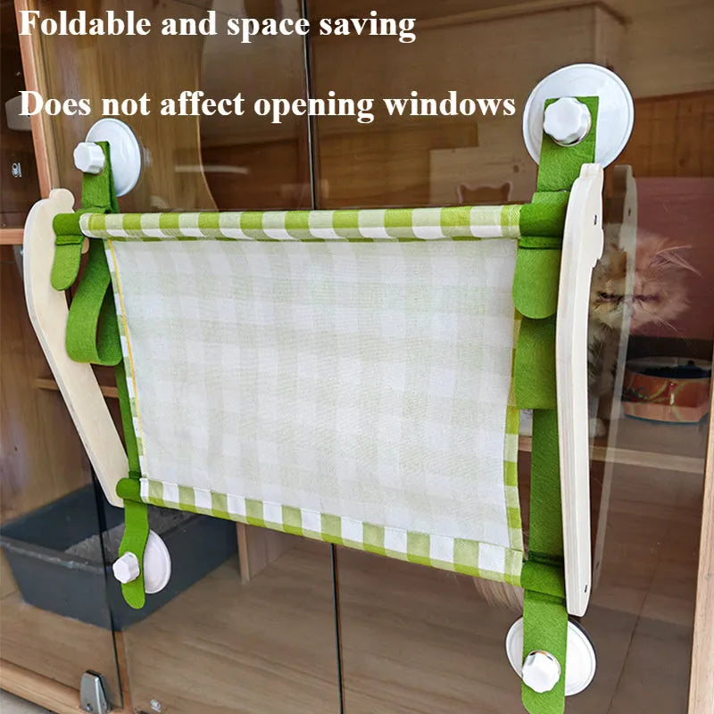 Wooden cat window hammock bed with suction cups mounted on glass, linen mat in green colour