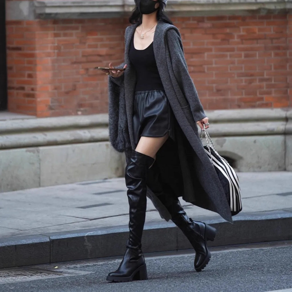 Long grey knitted cardigan with hooded trench coat design showing 80cm length and wool blend fabric texture