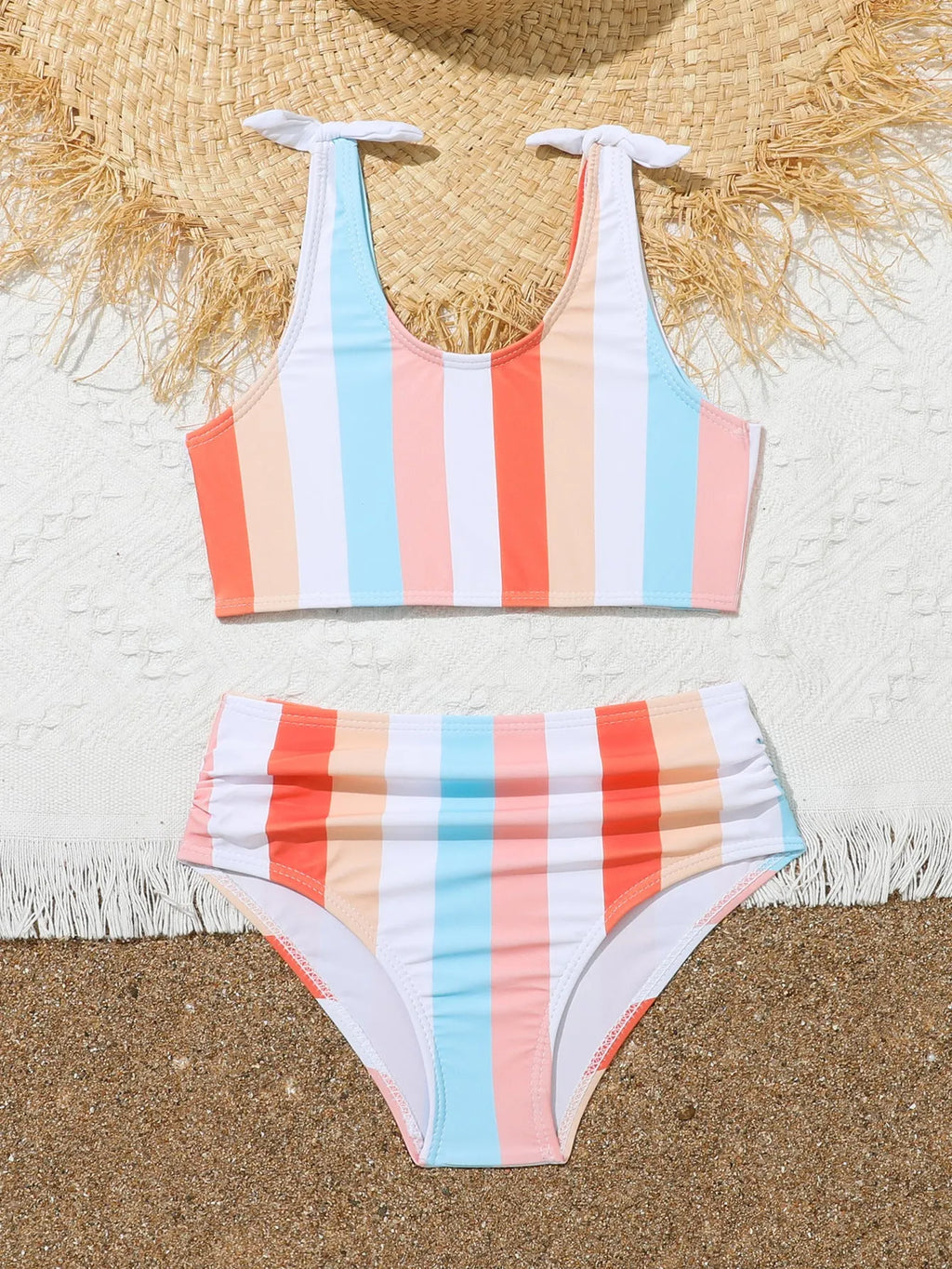 Girls plaid print swimsuit briefs with bra top, shown in multiple toddler and child sizes.