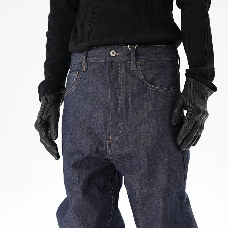 A pair of dark blue loose straight-leg men's jeans on a plain background.