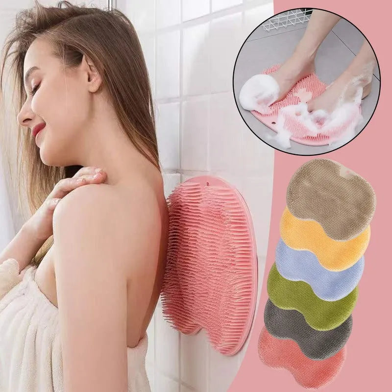 Orange massage bath brush with suction cups and silicone bristles on a 23x30cm TPR mat