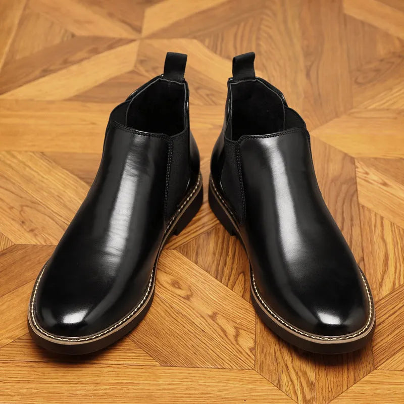 Men's black formal pointed-toe leather boots with a square rubber heel.