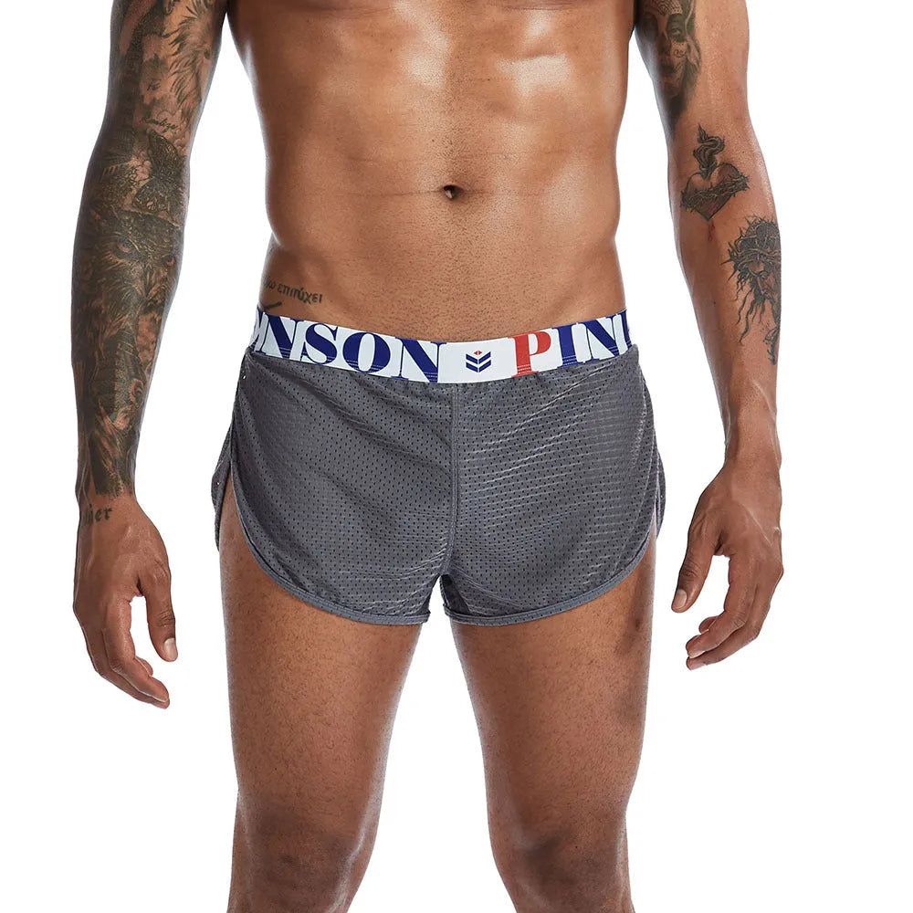 Men's solid colour mesh boxer briefs on a mid-waist fit model.