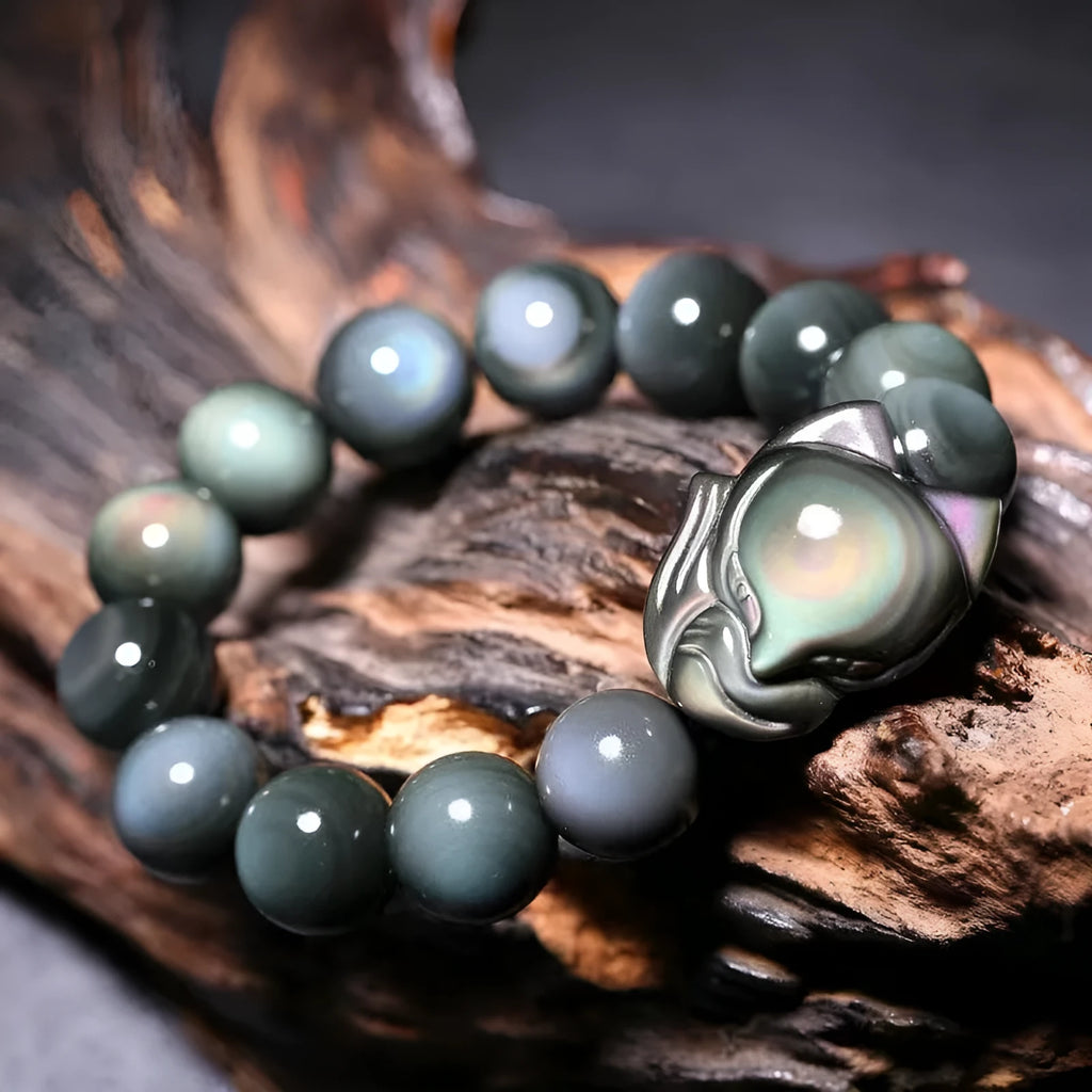 Obsidian fox carved couple bracelet showing animal zodiac design in cartoon style