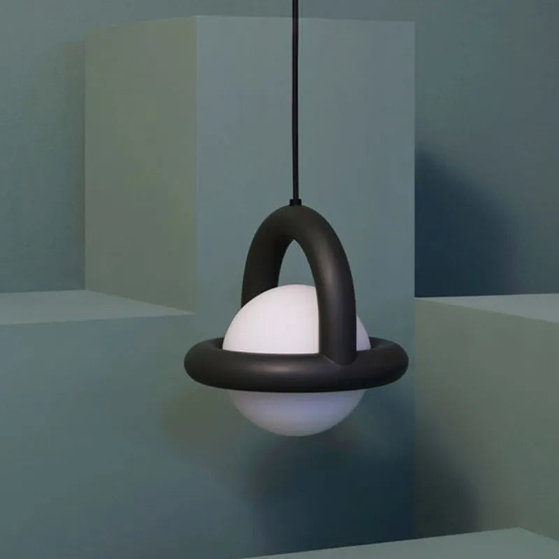 Adjustable hanging line lamp with metal shade in choice of colours, suspended over bedside table with adjustable height for bedroom lighting
