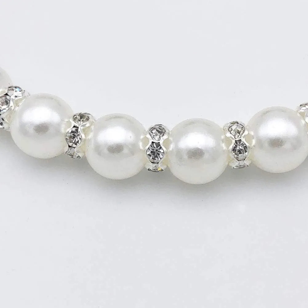 Diamond dog pearls necklace with adjustable clasp, imitation pearls, and rhinestones on soft ribbon for small pets