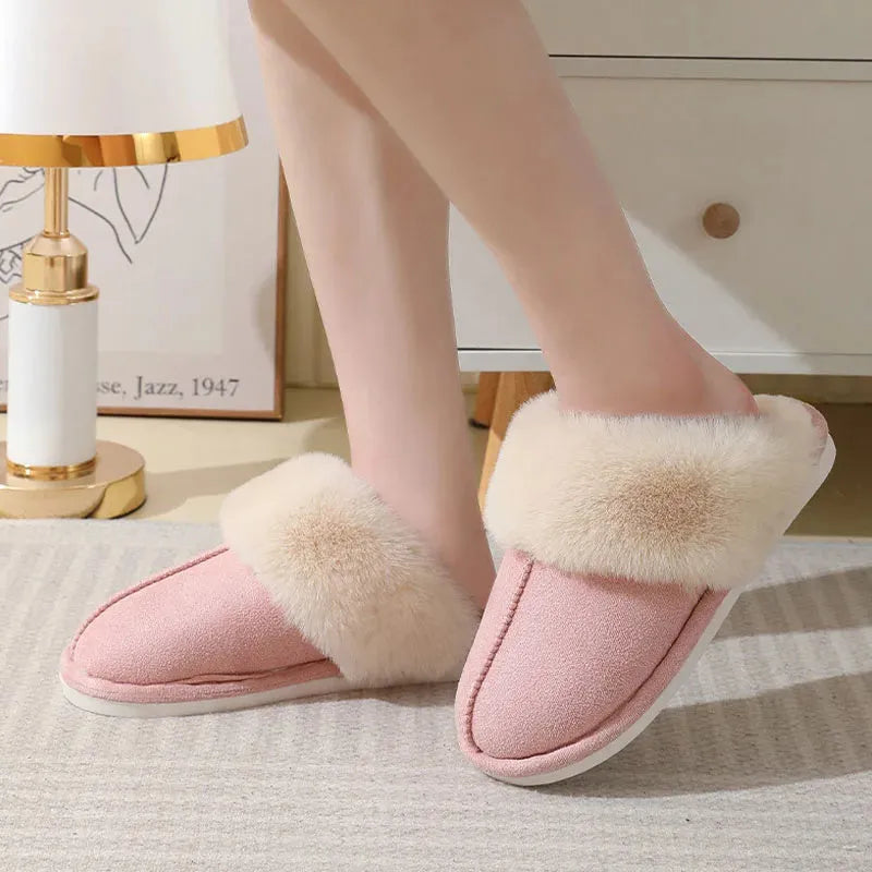 Women's brown plush indoor slippers with round toe, flat heel, and anti-slip PVC sole.