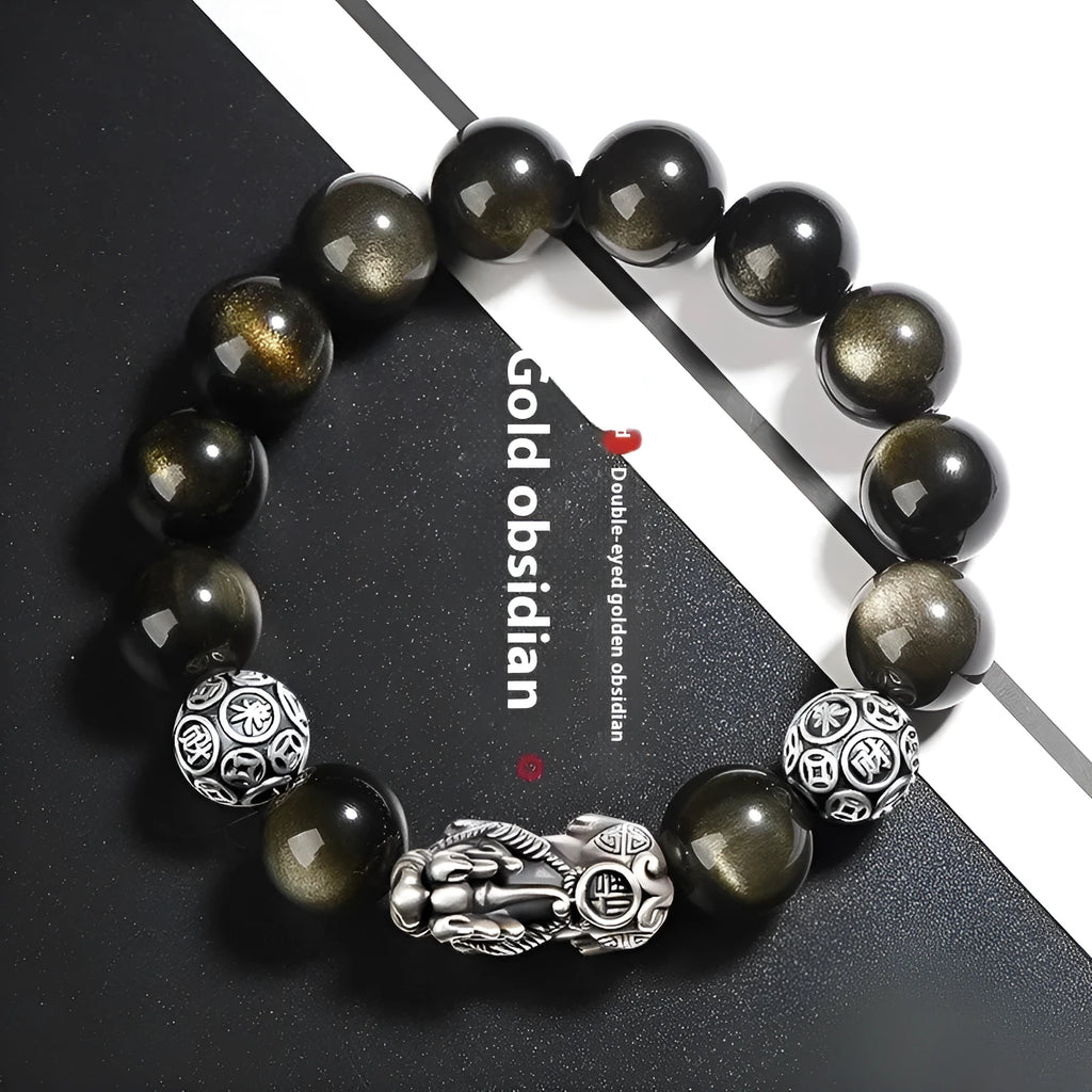 Men's geometric obsidian bracelet in sterling silver showing polished finish and natural stone detailing