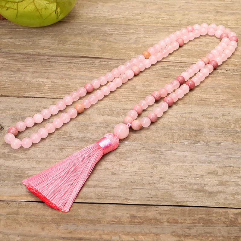 Stone bead string necklace and bracelet set with long fringe tassel pendant.