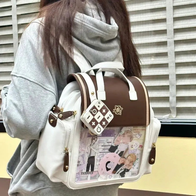Japanese style transparent colour backpack in blue or brown with soft polyester body, sandwich pocket, and transparent rubber plate.