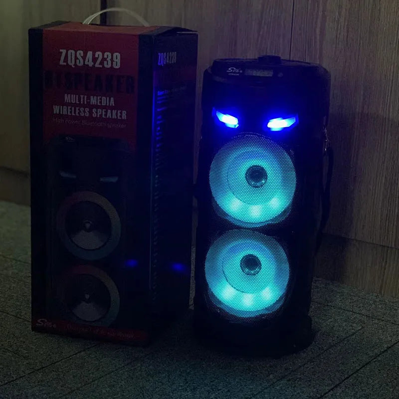 Black portable Bluetooth speaker with dual horn design and wheat-themed accents