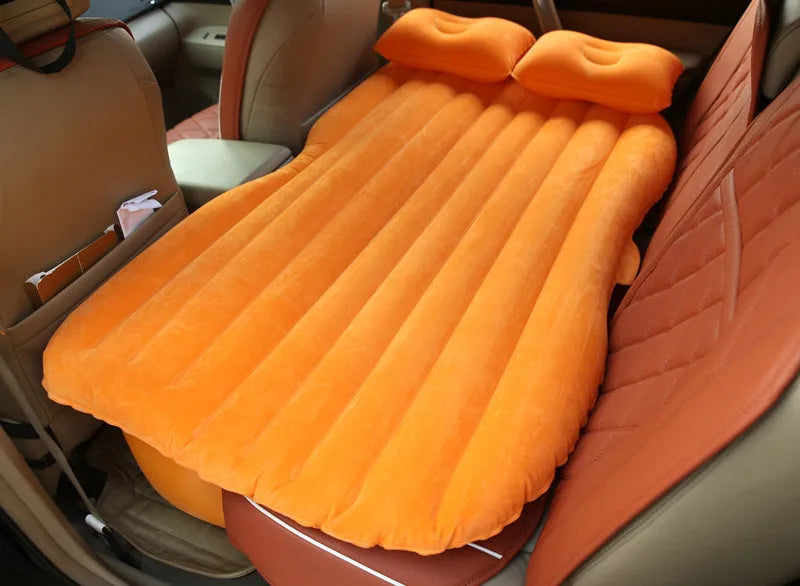 Black wave colour inflatable car bed with two pillows on a car seat