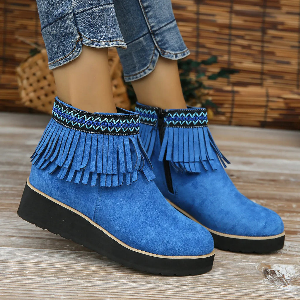 Women's suede wedge bootie in dark brown with side zipper and tassel detail on a 4cm rubber sole