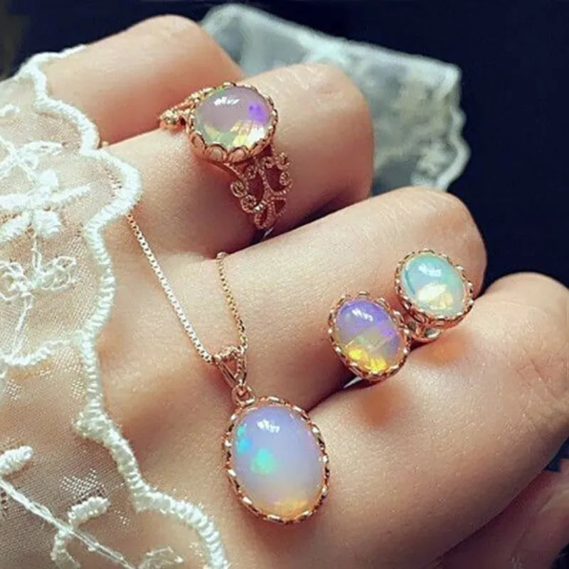 Women's alloy pendant necklace set with electroplated finish, inlaid gems, earrings, and hand accessories