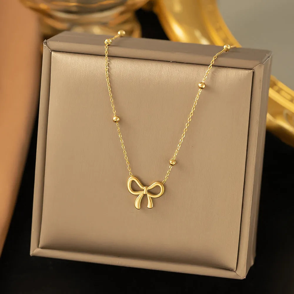Gold bow necklace with adjustable 41-50cm titanium steel cross chain, European fashion design