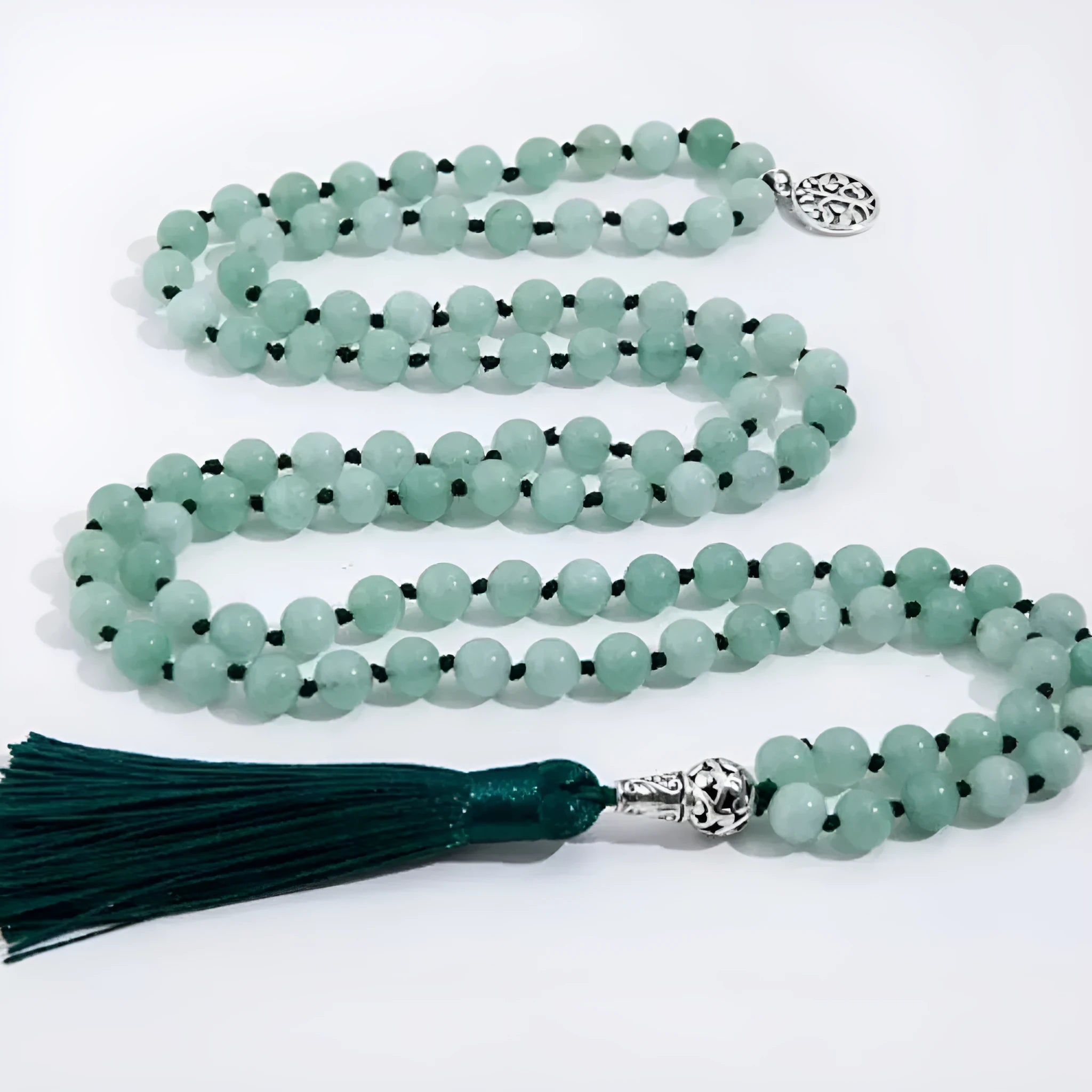 Handmade knotted beaded necklace with 108 stone pendants showing colour variations