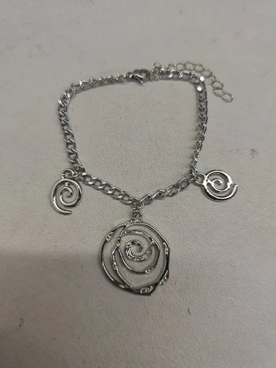 Spiral donut jewellery set with necklace, bracelet, and earrings in gold electroplated alloy