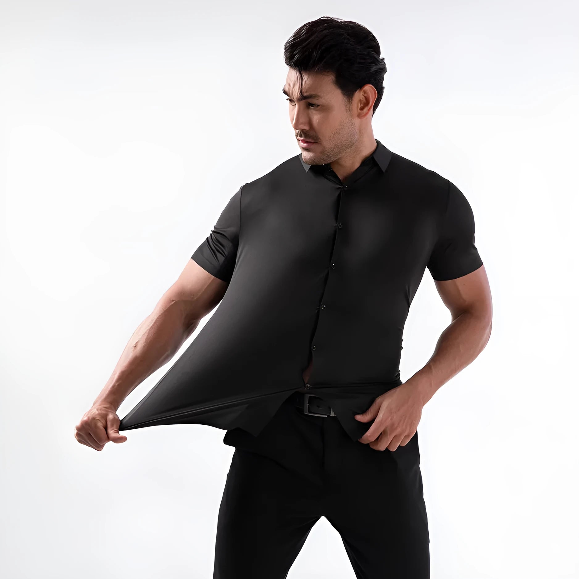Man wearing a grey short sleeve cardigan-style shirt with four-side elastic, non-ironing fabric.