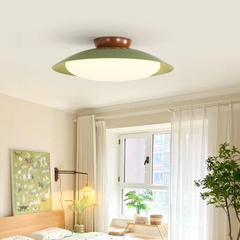 Modern flying saucer ceiling lamp with minimalist design in cream-style finish, showing diameter options and colour variations
