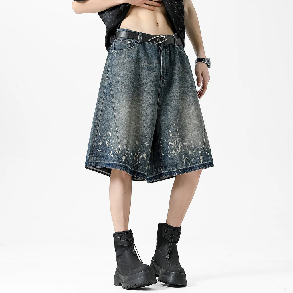 Men's retro washed blue denim shorts with five-point ripped splash ink design in straight cut