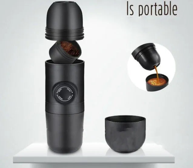 Black portable manual coffee machine showing compact size for travel