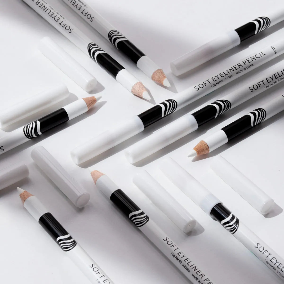 Box of 12 white waterproof eyeliner pencils with high gloss finish for eye brightening