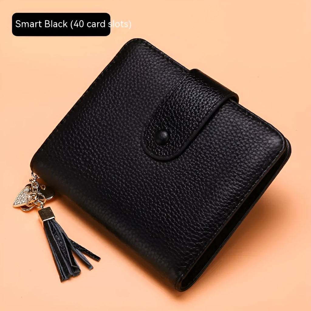 Large capacity genuine cowhide leather card holder wallet with tassel, snap closure, 40 card slots, and ID holder