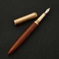 Brass and solid wood signature pen in choice of five wood finishes including ebony and rosewood.