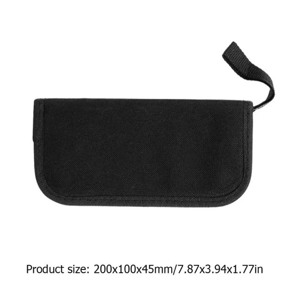 Black guitar repair kit case open showing metal and plastic tools including truss rod wrench, fret files, and string winder