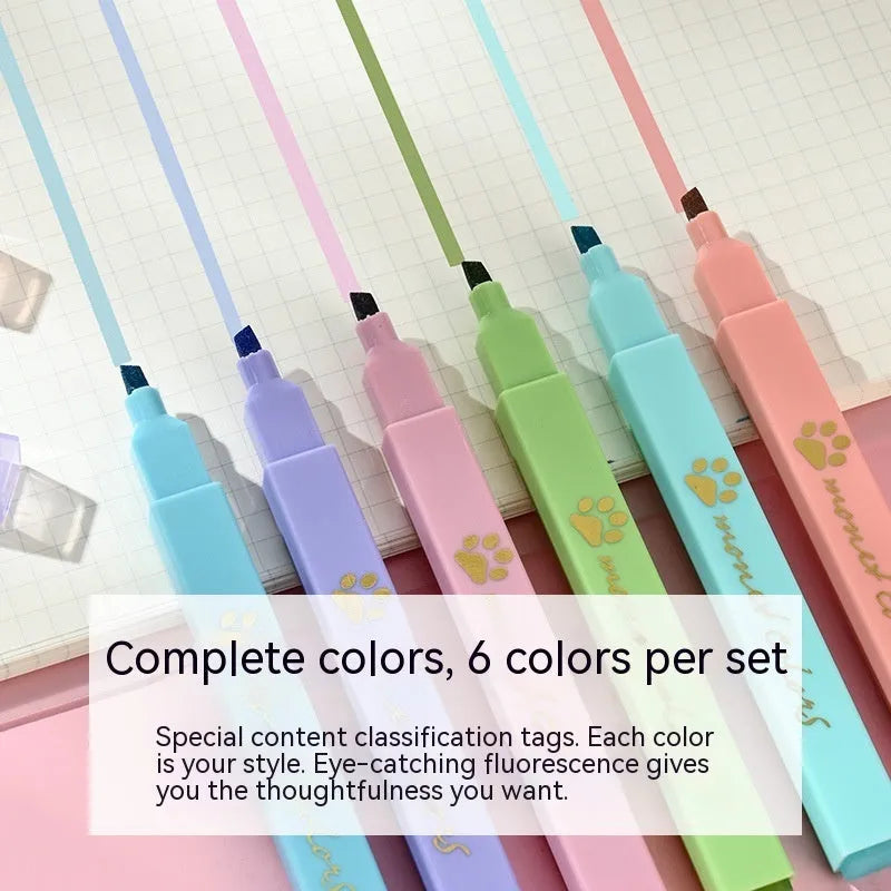Box of six cat's paw fluorescent marking pens with oblique nib tips in assorted colours.