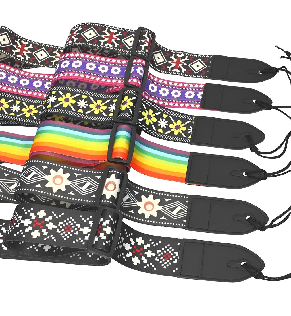 Printed cloth guitar shoulder strap showing eight graphic design options including national flag and space patterns