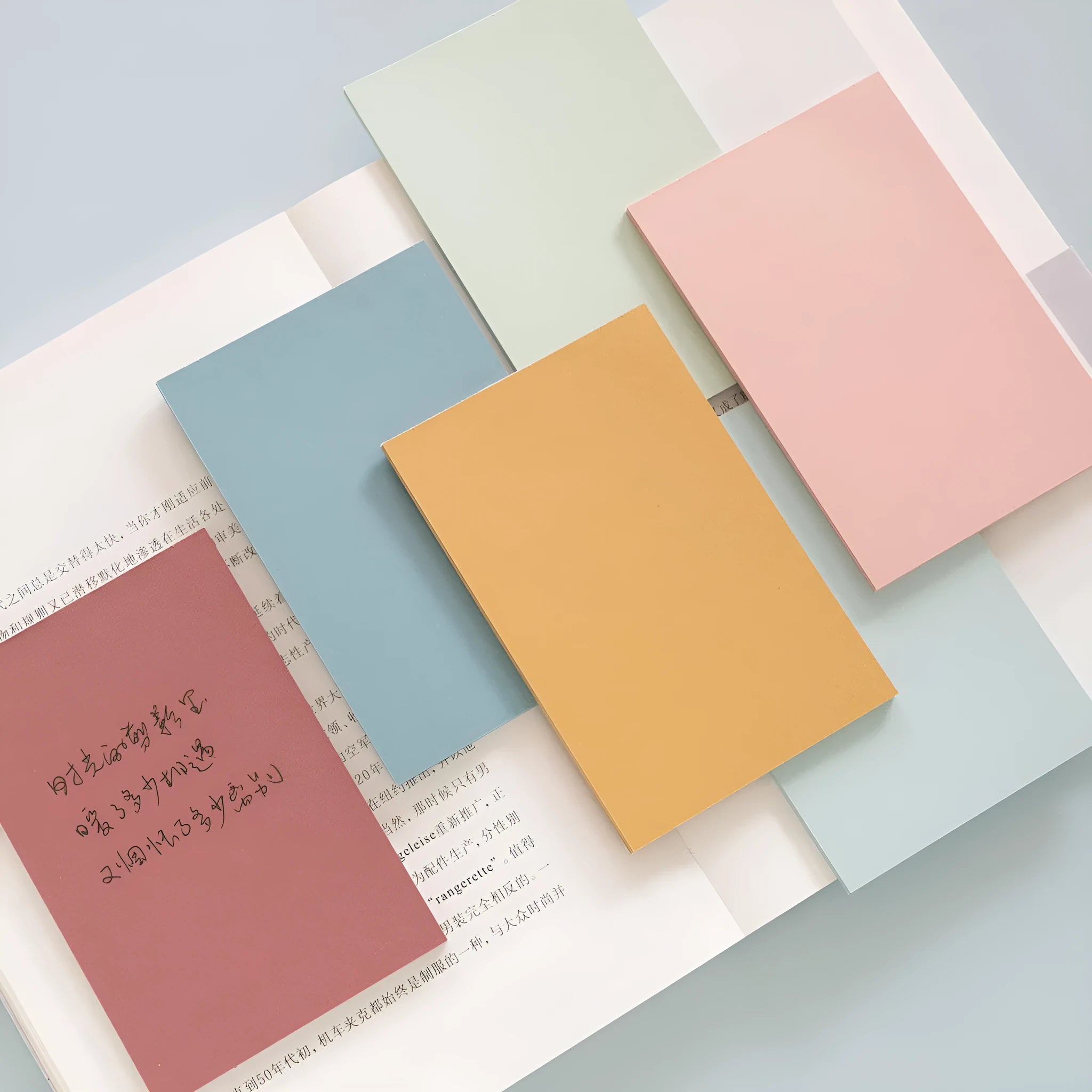 Pack of large 12cm x 8cm sticky notes in six different colours, 150 sheets total